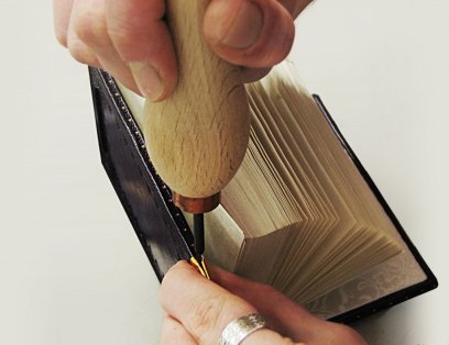 Exclusive hand bound book designing.